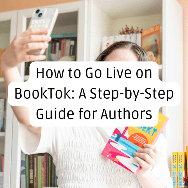 An author holding a smartphone to film a TikTok Live stream in front of a white bookshelf, holding up a colorful book. Text overlay reads: How to Go Live on BookTok: A Step-by-Step Guide for Authors.